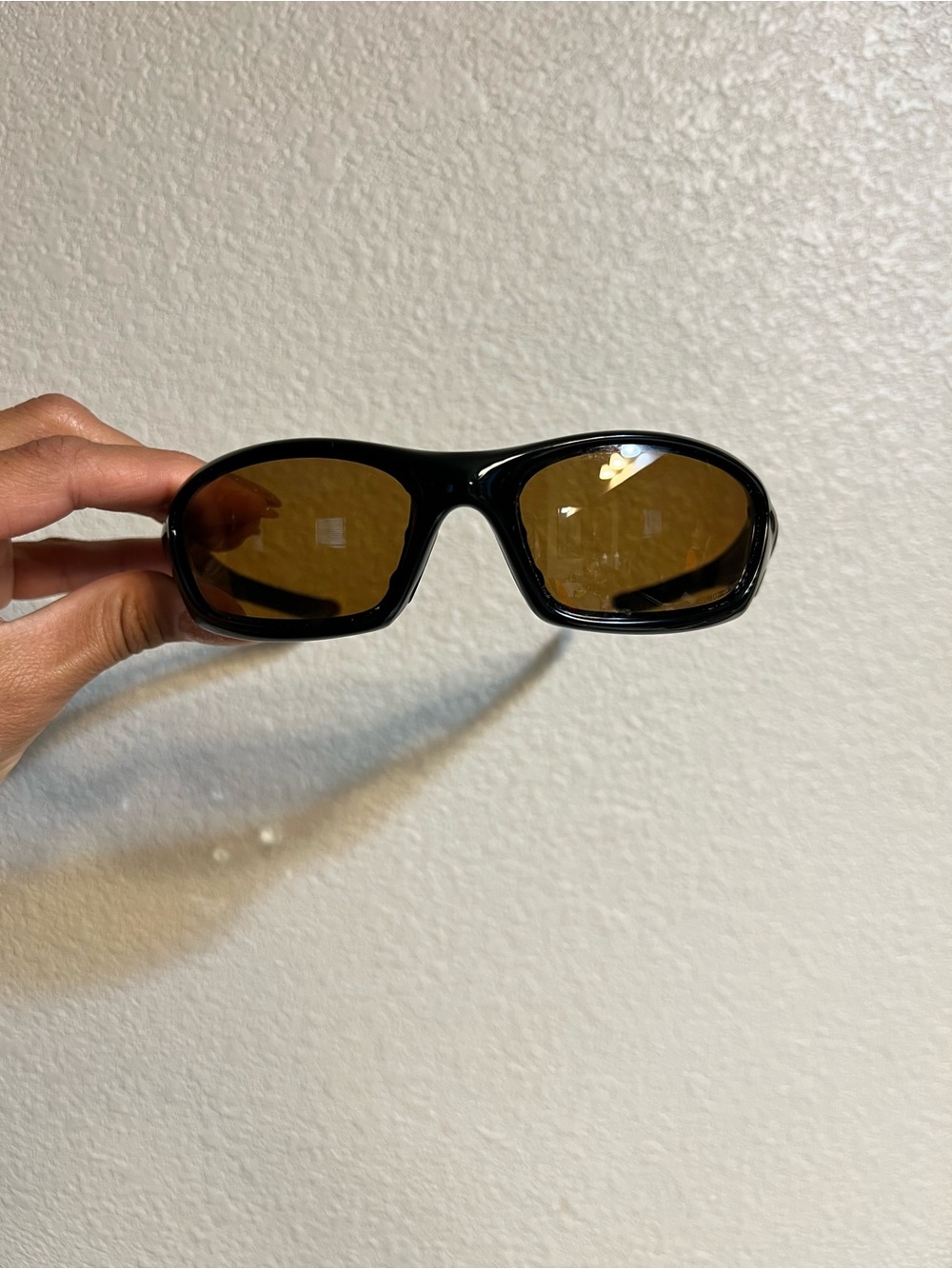 Oakley Black Frame Sunglasses with Brown Lenses